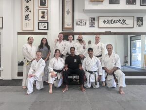 Group photo at Goju-Ryu Seiwa-Kai Karate of LA showing Hanshi Vassie Naidoo, visiting Sensei Sanjit Mandal, Sensei Edison Valente, Senpai Mike Lavin, Senpai Matt Costello, Senpai Conrad Williams, and students