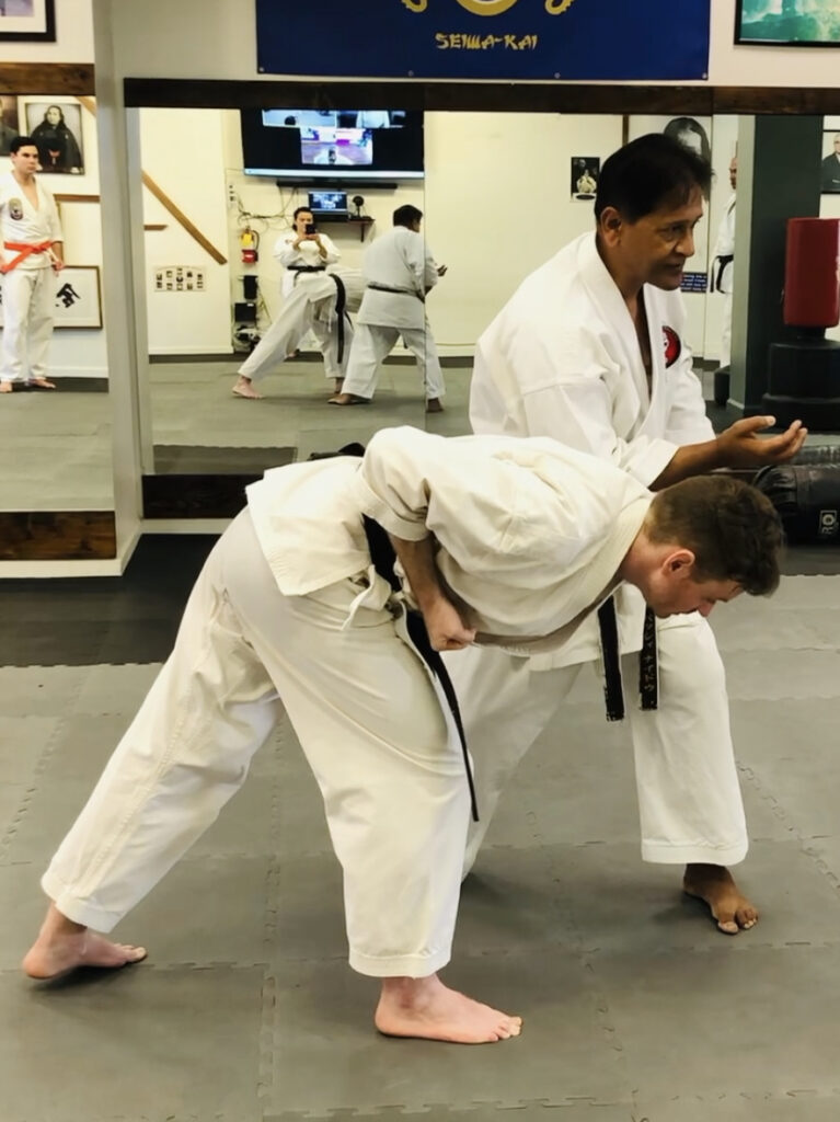 Private Karate Coaching Los Angeles Shihan Vassie Naidoo teaching private karate lessons and pad work drills at Karate of LA.