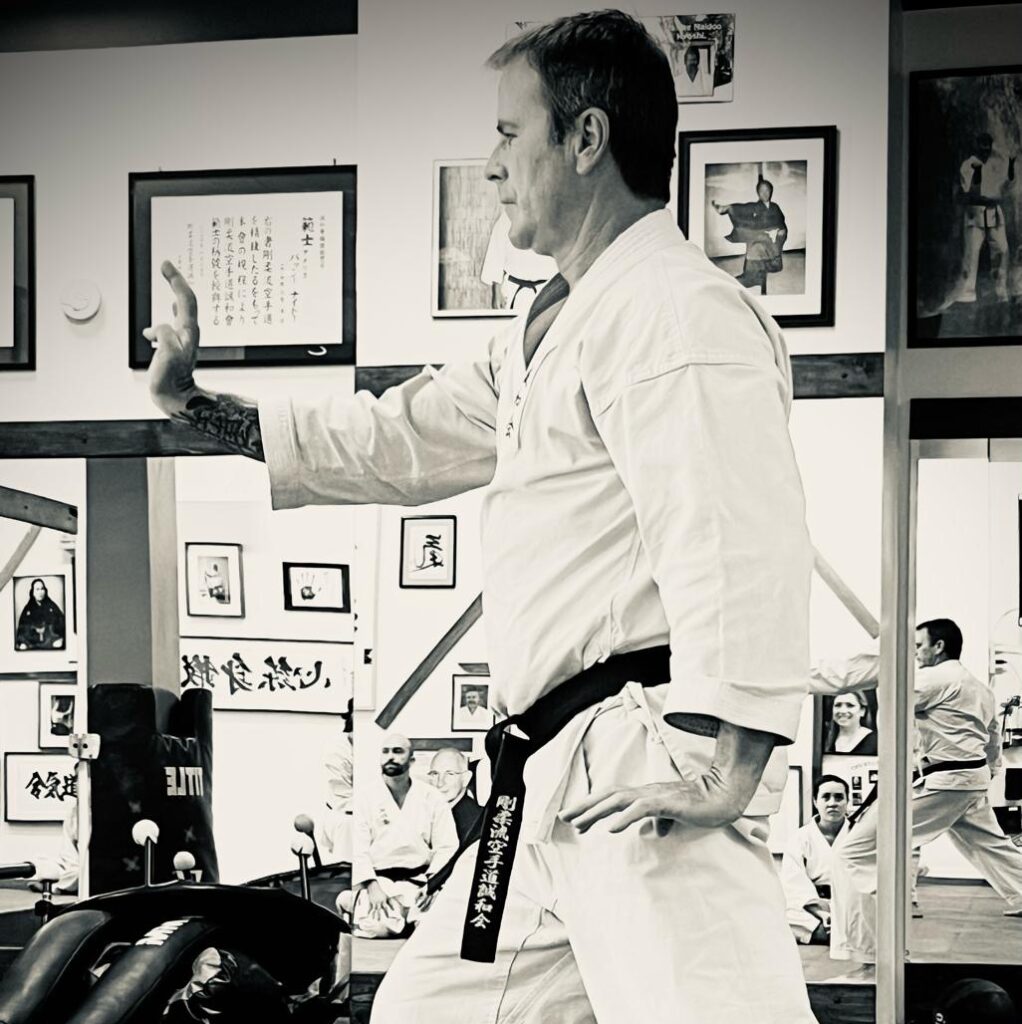 Senpai Mike Lavin, 4th Dan Goju-Ryu karate instructor at Karate of LA, demonstrating a traditional forward stance and block.
