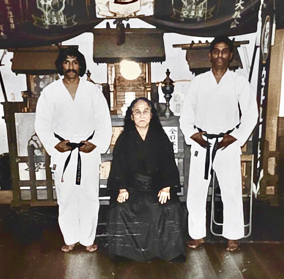 Young Vassie Naidoo Shihan training in traditional Goju-Ryu karate in Tokyo next to Grandmaster Gogen Yamaguchi.