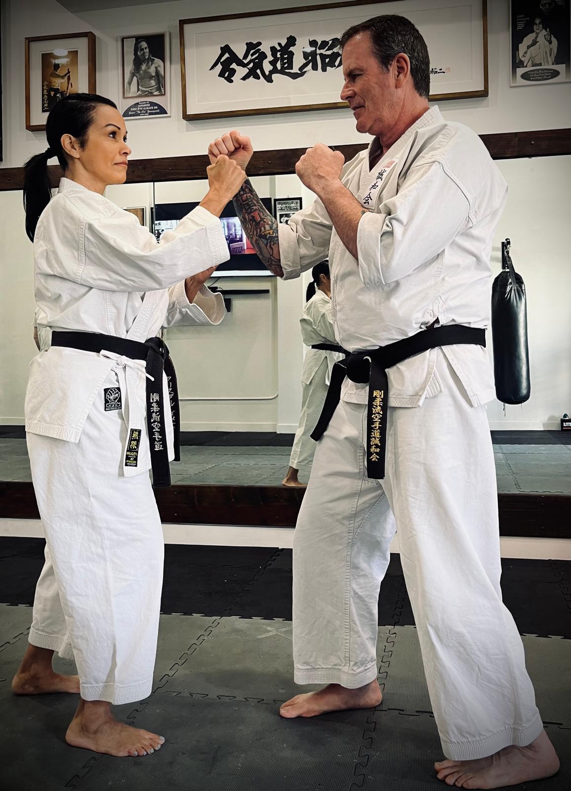 Senpai Crystal Villagran and Senpai Mike Lavin training together in adult Goju-Ryu karate at Karate of LA